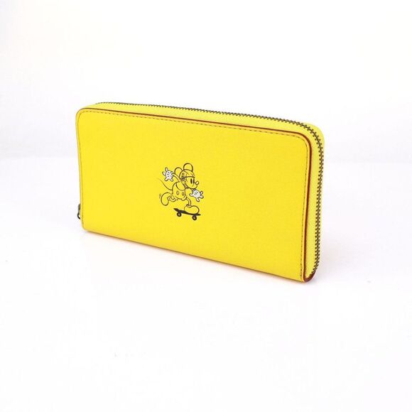 New Coach Disney Mickey Riding Skateboard Accordion Zip Wallet Banana Yellow - Picture 1 of 12